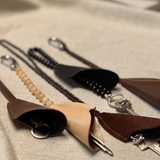 Brown leather and ox-eye key holder