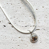 Snail shell charm